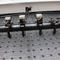Máy cắt khắc laser 4 đầu có thể di chuyển lẫn nhau 80W 100W cho thảm trải thảm nylon